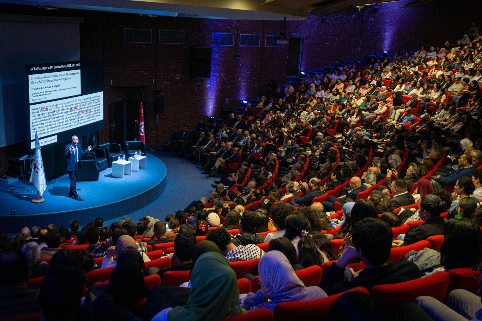 Speaker presenting at an Eventi X conference