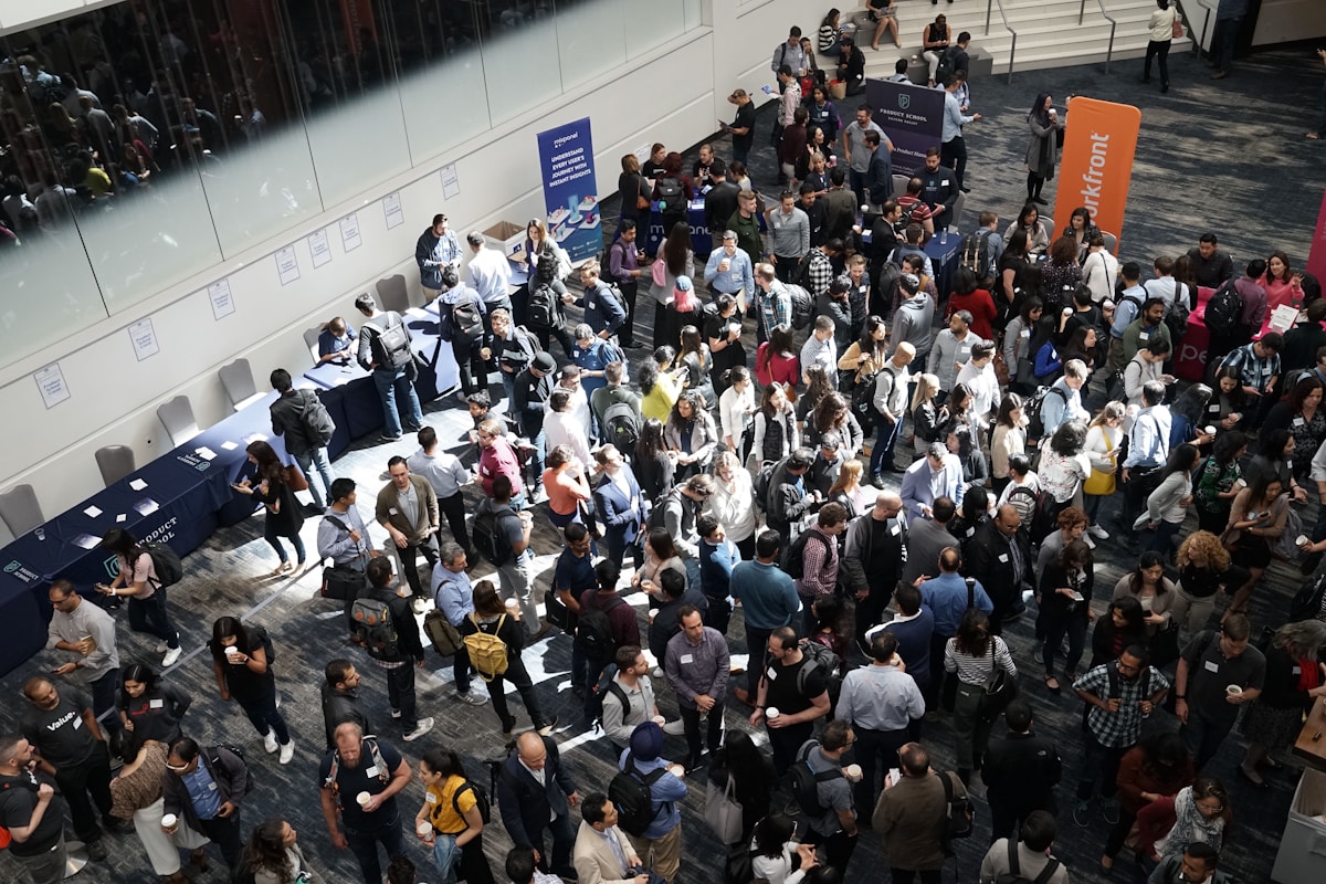 Conference attendees networking in an event hall